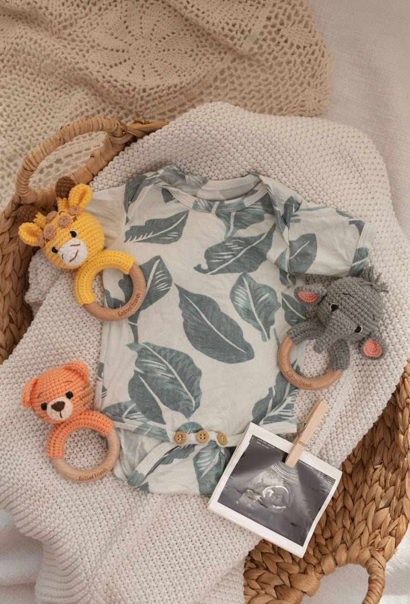 Handmade crochet tiger rattle with giraffe rattle made by Knitted Friends