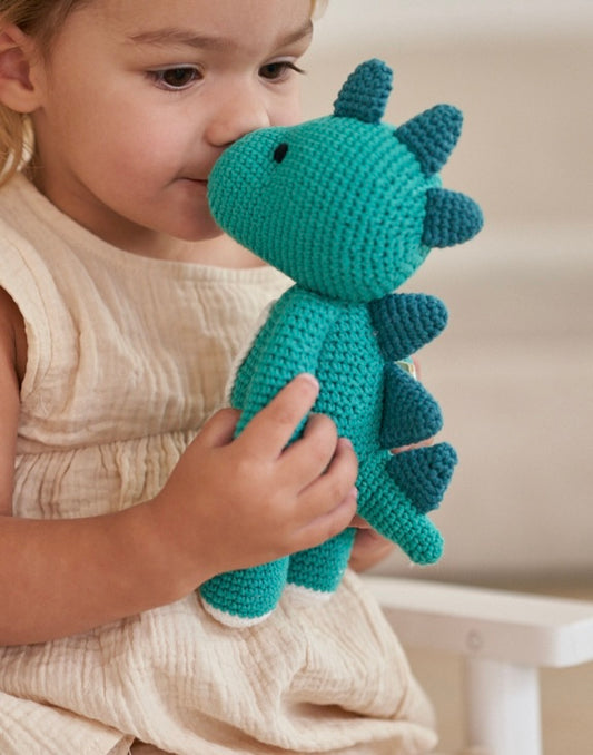 Handmade teal crochet dinosaur doll in organic cotton by Knitted Friends