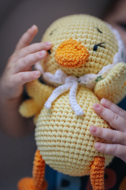 Organic cotton crochet duck toy for babies, handmade by Knitted Friends
