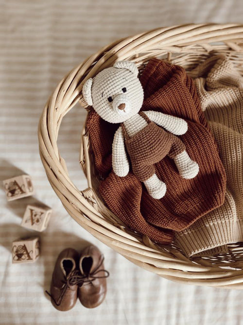 Handmade knitted baby bear doll by Knitted Friends