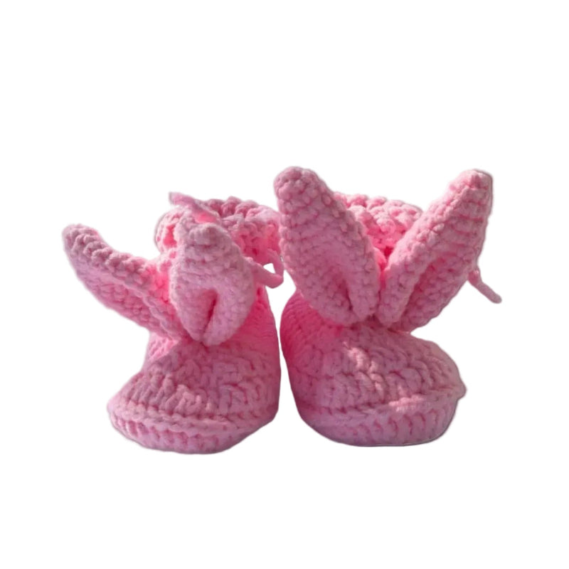 Pink crochet bunny baby booties with soft knitted ears, handmade by Knitted Friends
