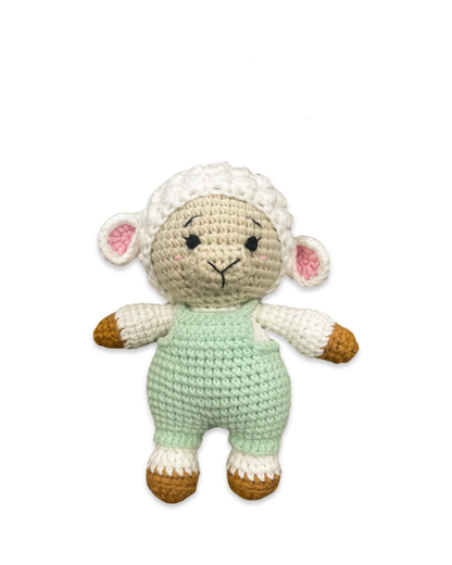 Front view of a handmade crocheted sheep doll wearing a green outfit with soft textured details crafted by Knitted Friends