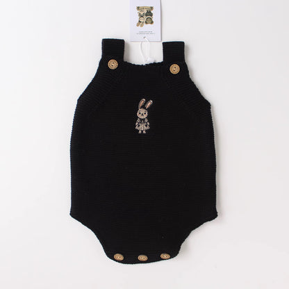 Black knit baby onesie with bunny design in organic cotton by Knitted Friends