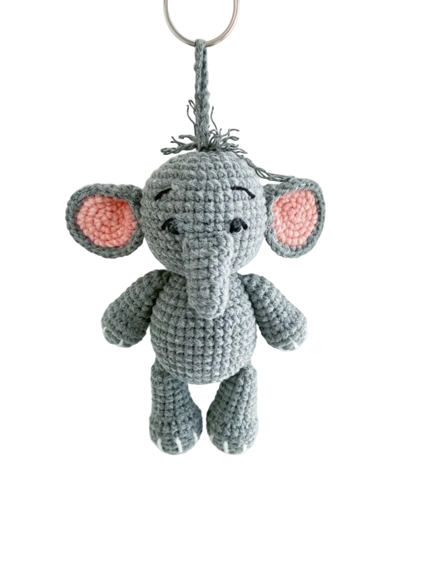 Handmade crochet elephant bag charm with grey body and pink ears by Knitted Friends