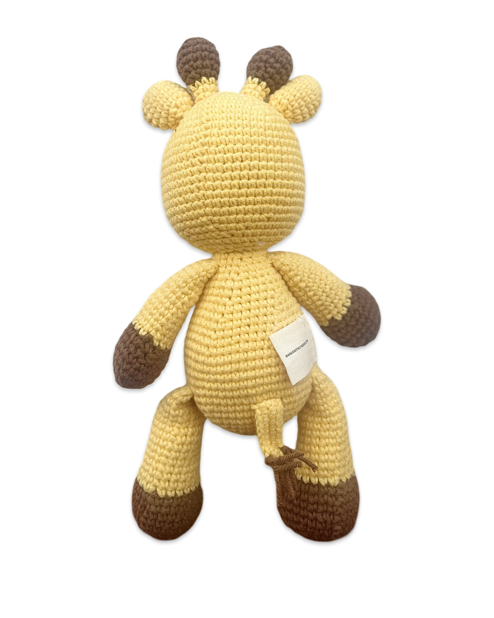 Handmade knitted giraffe doll by Knitted Friends