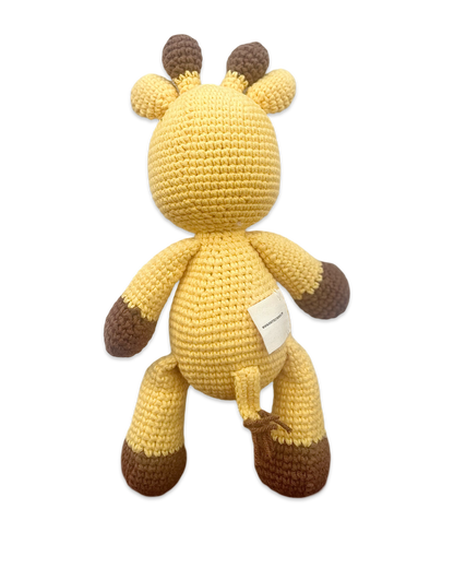 Handmade knitted giraffe doll by Knitted Friends