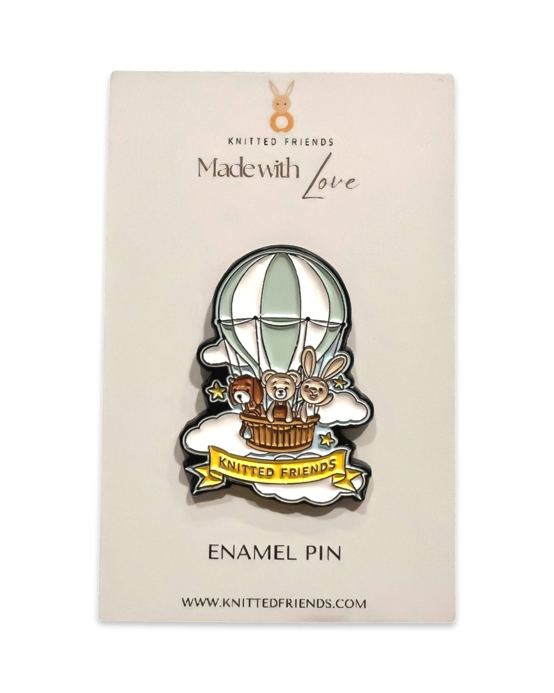 Knitted Friends enamel pin featuring a hot air balloon with animal characters, displayed on branded “Made with Love” card packaging