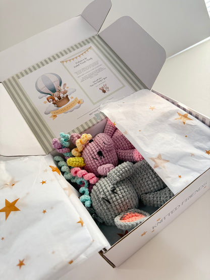 Handmade crochet unicorn bag charm gift packaging with organic cotton toys in Knitted Friends box